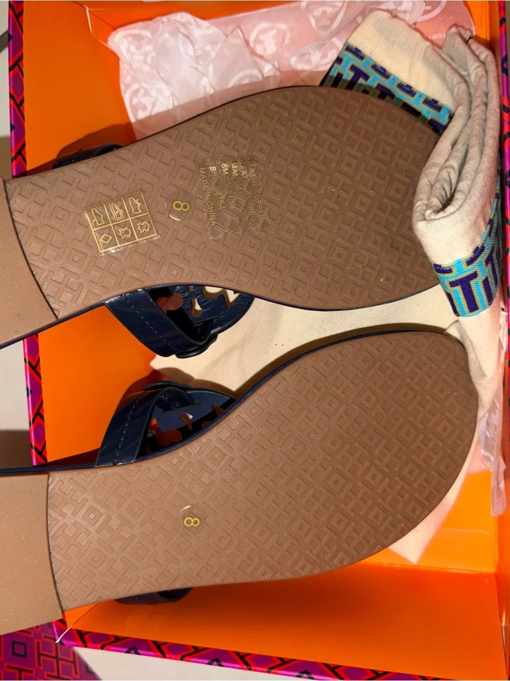 Tory Burch Navy Flip Flops with Rainbow Logo Medallions